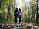 forest-trees-leaves-autumn-walk-away-woman-man-couple.jpg