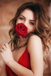 portrait-beautiful-brunette-girl-red-rose-stock-photo-150531823.jpg