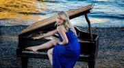 beautiful-girl-piano-sea-wallpaper-preview.jpg