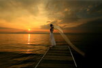 desktop-wallpaper-waiting-breeze-blowing-golden-sky-alone-clouds-dock-sunset-ocean-woman-waiting.jpg